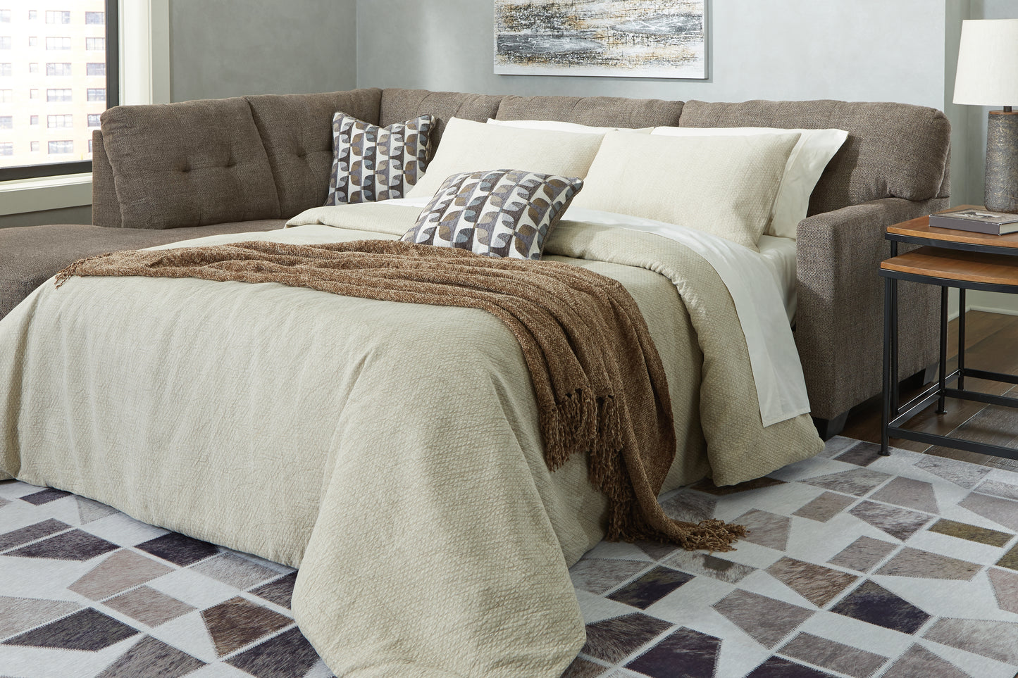 Haines Furniture Outlet - Ashley Furniture - Mahoney Sectional - RAF 2-Piece Sleeper Sectional with Chaise / Chocolate - 31005S3
