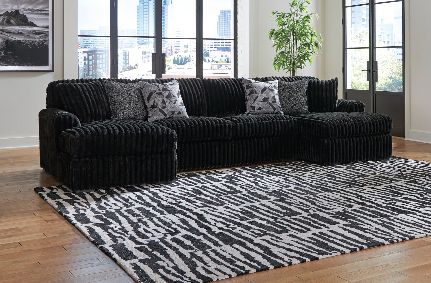 Haines Furniture Outlet - Ashley Furniture - Midnight-Madness Sectional - RAF 3-Piece Sectional with Chaise / Onyx - 98103S5