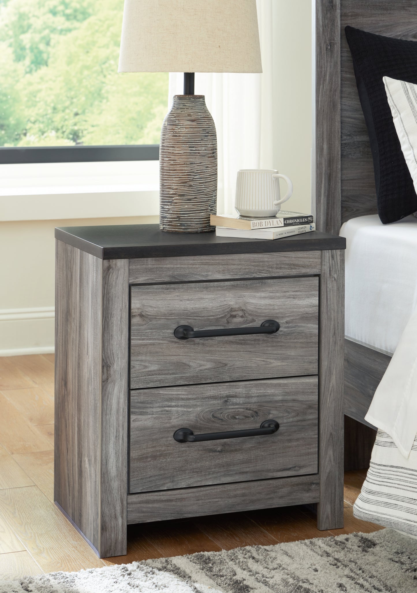 Haines Furniture Outlet - Ashley Furniture - Bronyan Bedroom - Two Drawer Night Stand / Dark Gray - B1290-92