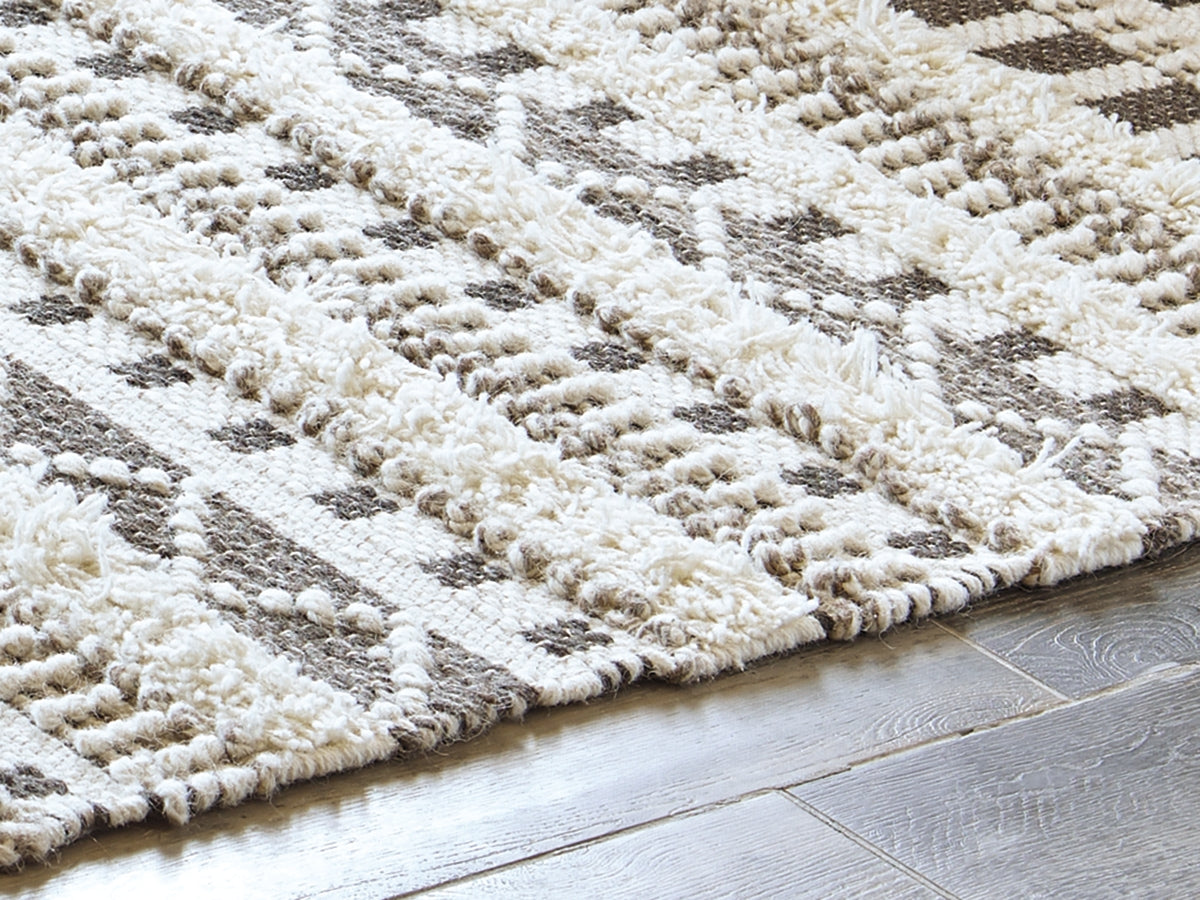 Haines Furniture Outlet - Ashley Furniture - Karalee Rug - 5' x 7' Rug / Ivory/Brown - R404442
