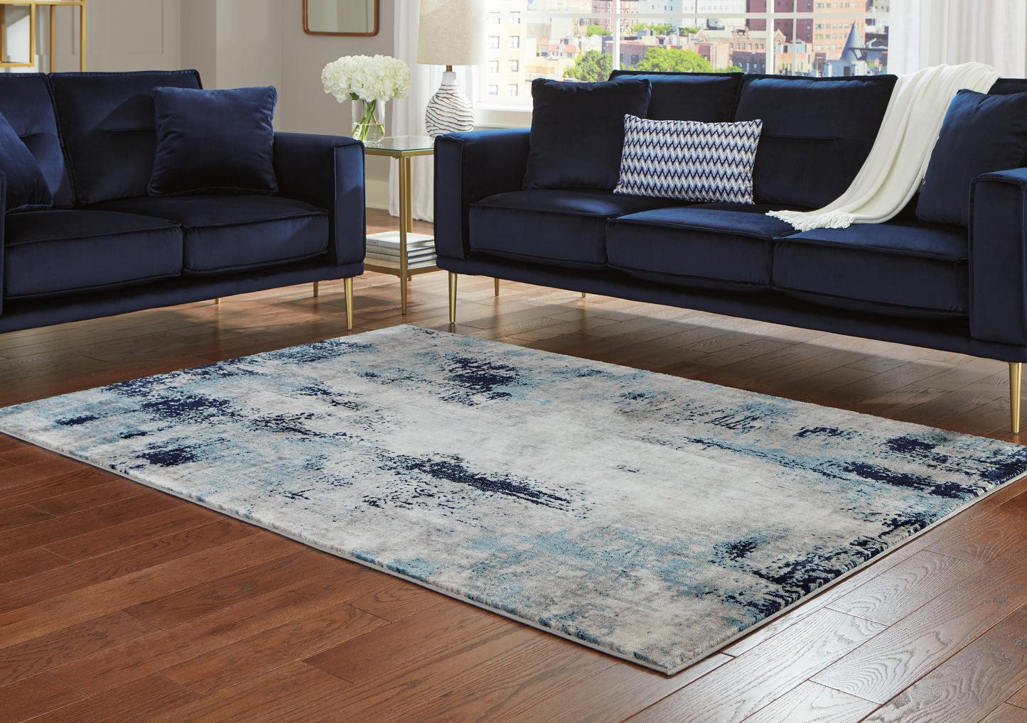 Haines Furniture Outlet - Ashley Furniture - Leonelle Rug - 5'3" x 7'3" Rug / Cream/Blue/Gray - R404872