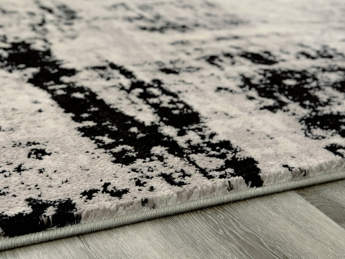 Haines Furniture Outlet - Ashley Furniture - Zekeman Rug - 7'10" x 10' Rug / Black/Cream/Gray - R404921