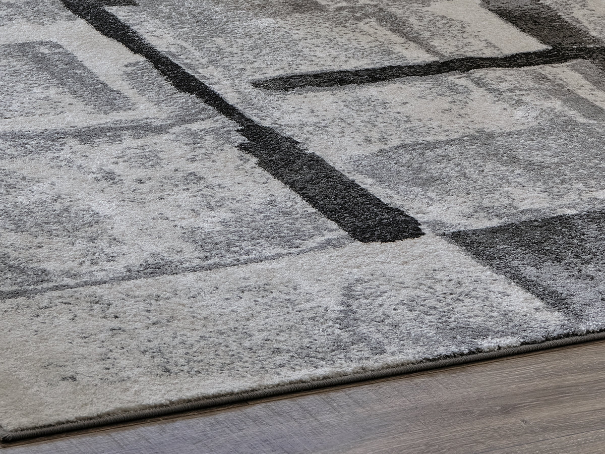 Haines Furniture Outlet - Ashley Furniture - Brycebourne Rug - 5'3" x 7'7" Rug / Black/Cream/Gray - R404982