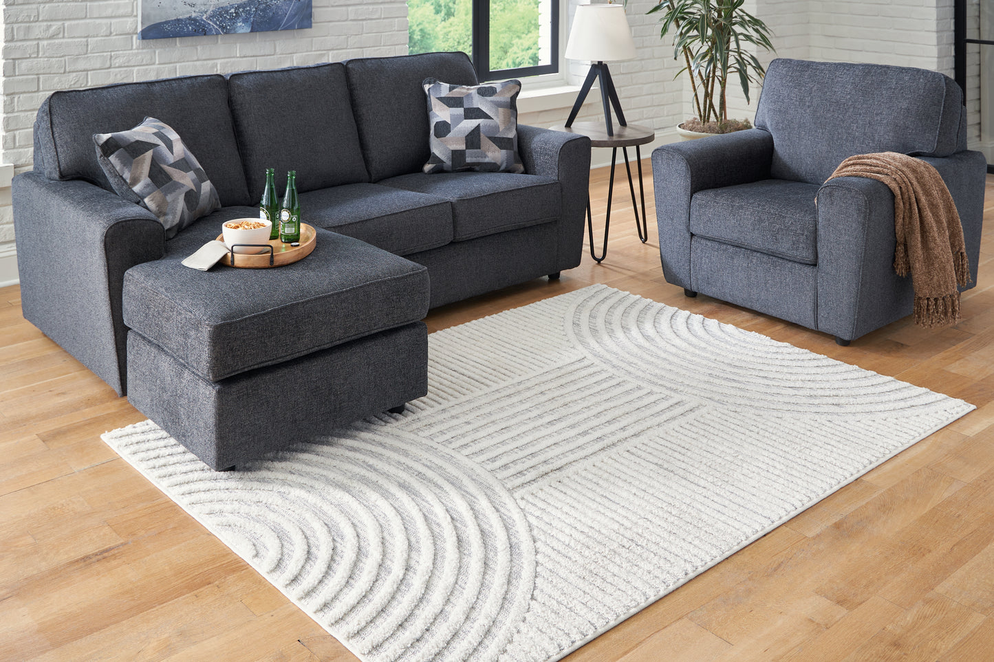 Haines Furniture Outlet - Ashley Furniture - Lambworth Rug - 5'3" x 7' Rug / Gray/Cream - R405342