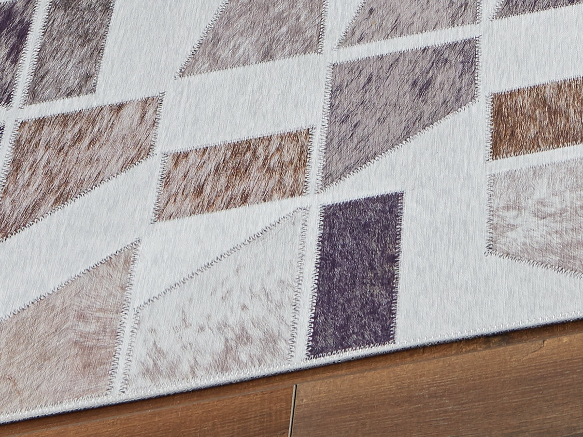 Haines Furniture Outlet - Ashley Furniture - Jettner Rug - 7'10" x 10' Rug / Multi - R405781