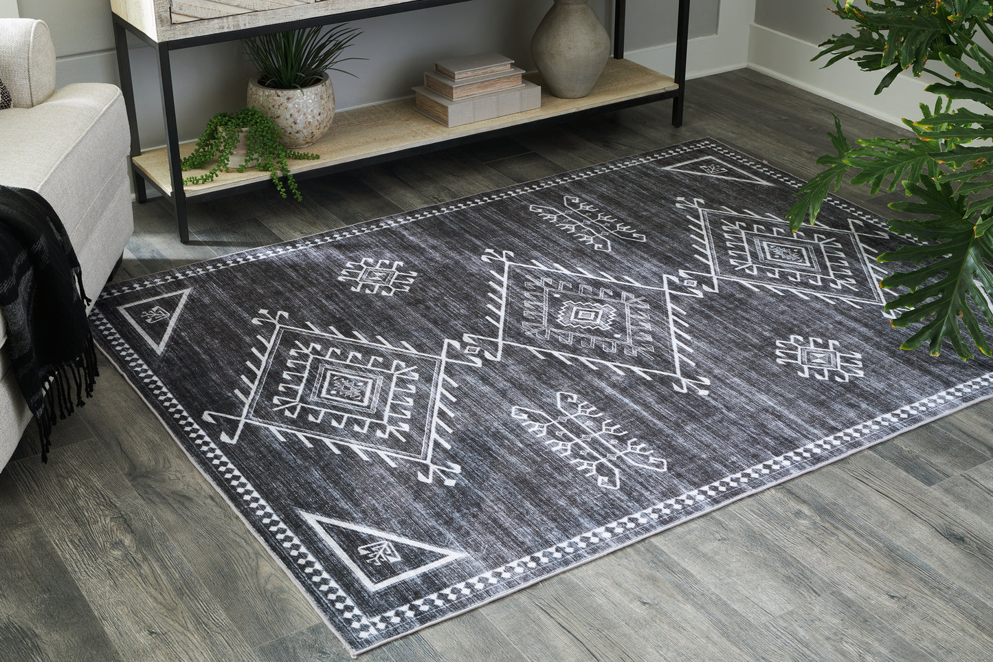 Haines Furniture Outlet - Ashley Furniture - Arloman Rug - 5' x 7' Washable Rug / Black/Cream/Gray - R405932