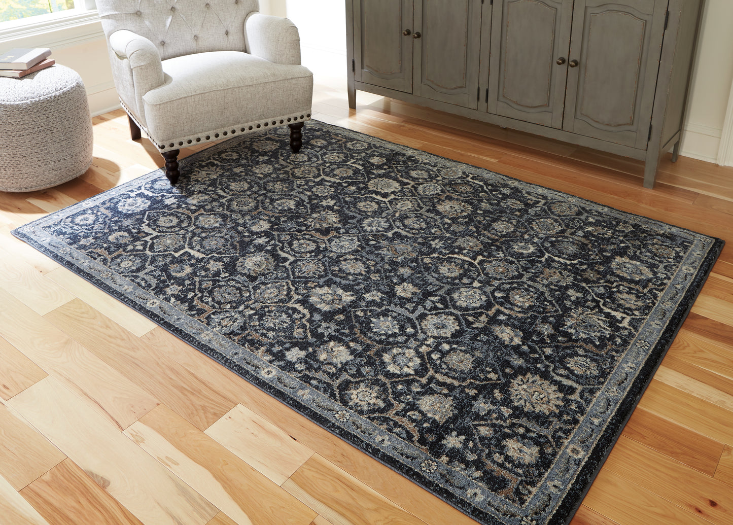 Haines Furniture Outlet - Ashley Furniture - Hilcott Rug - 5'3" x 7'3" Rug / Blue/Cream/Brown - R406112