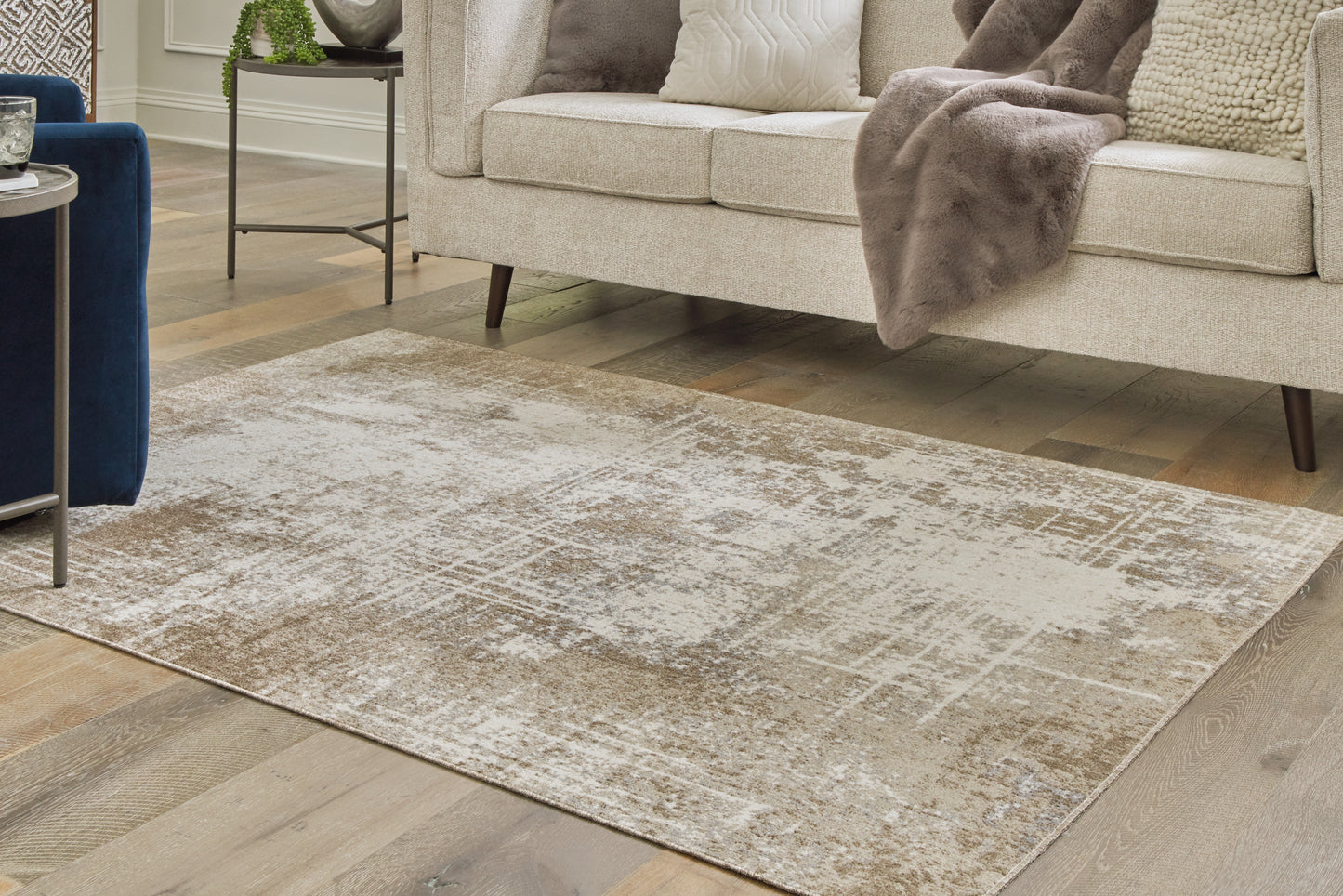 Haines Furniture Outlet - Ashley Furniture - Grifflain Rug - 5'1" x 7' Washable Rug / Tan/Brown/Gray - R406232