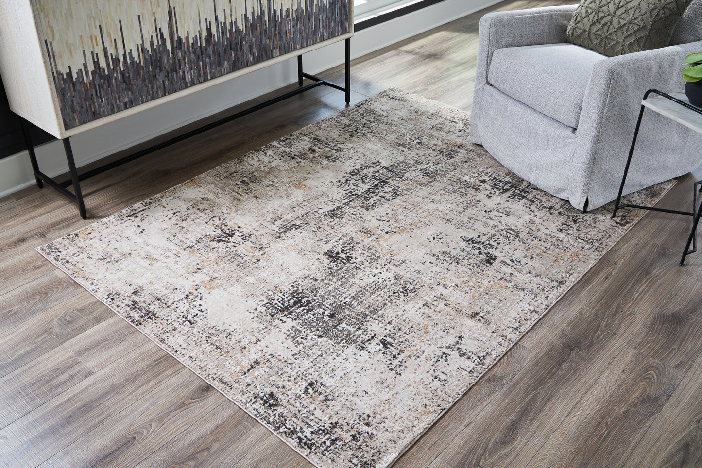 Haines Furniture Outlet - Ashley Furniture - Elaning Rug - 5' x 7' Rug / Black/Gray/Cream - R406702
