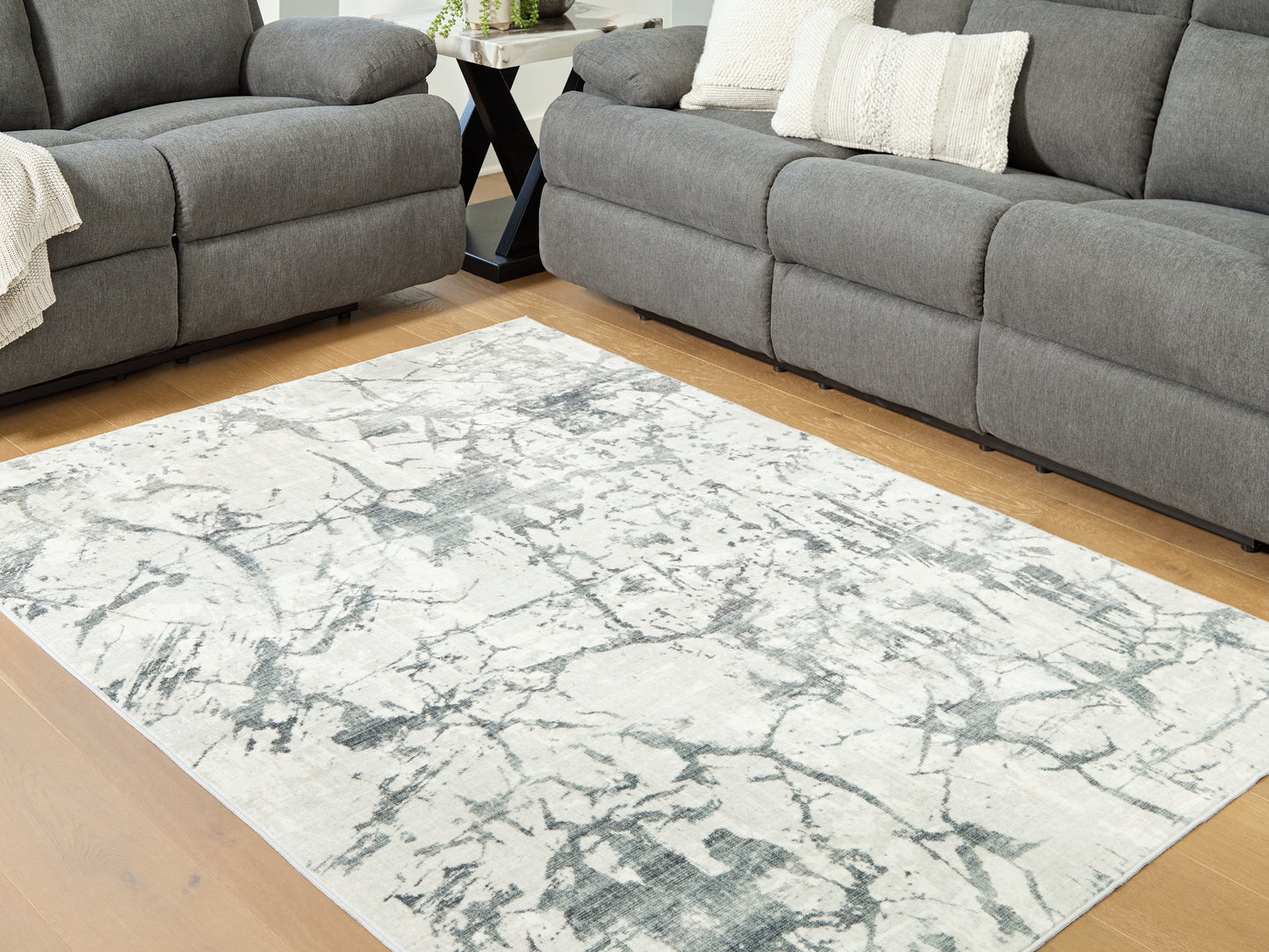 Haines Furniture Outlet - Ashley Furniture - Tobinbury Rug - Washable 5' x 7' Area Rug / Gray - R407422