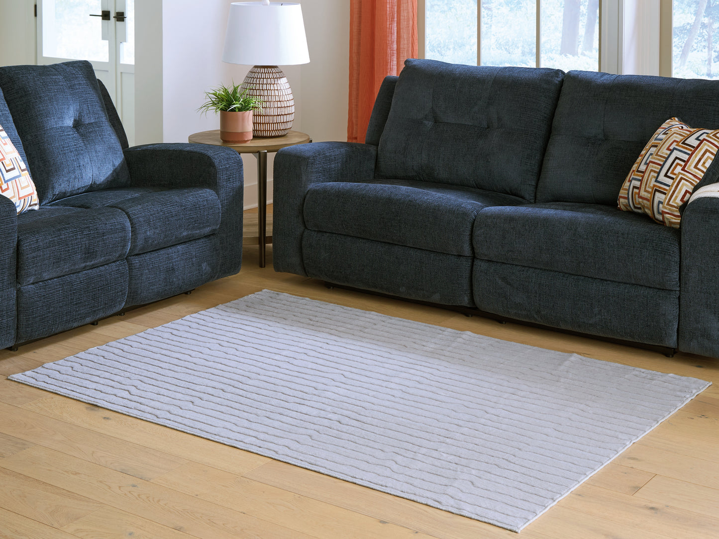 Haines Furniture Outlet - Ashley Furniture - Worthley Rug - Washable 5' x 7' Area Rug / Gray - R407452