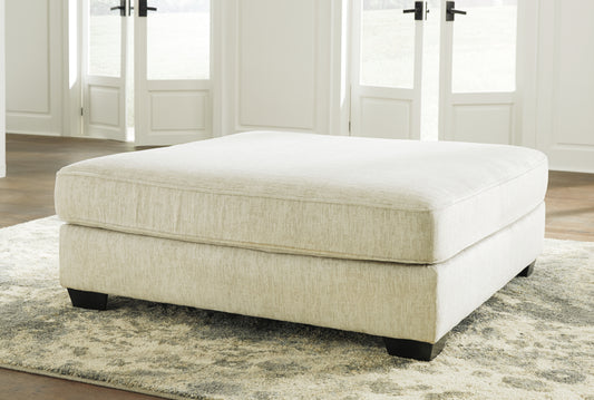Haines Furniture Outlet - Ashley Furniture - Rawcliffe Living Room - Oversized Accent Ottoman / Parchment - 1960408