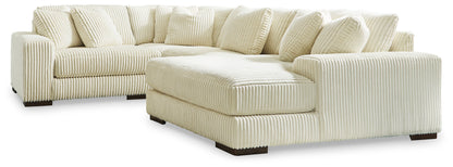 Haines Furniture Outlet - Ashley Furniture - Lindyn Sectional - RAF 4-Piece Sectional with Chaise / Ivory - 21104S15