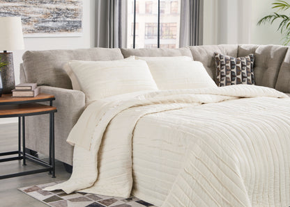 Haines Furniture Outlet - Ashley Furniture - Mahoney Sectional - 2-Piece Sleeper Sectional with Chaise / Pebble - 31004S4