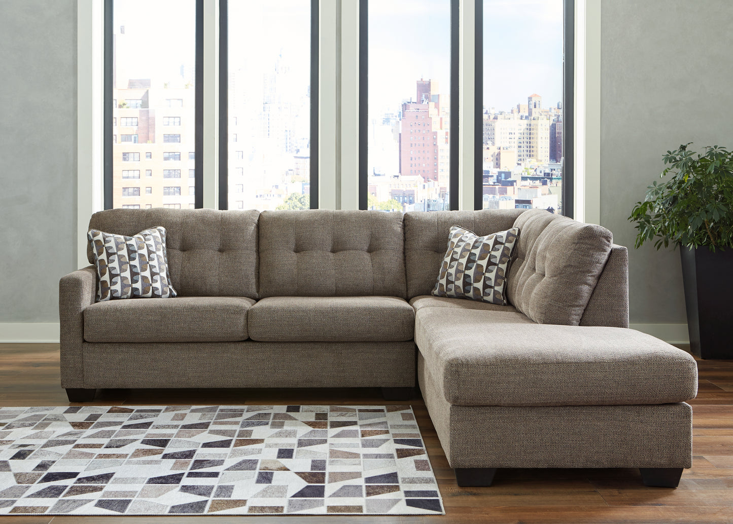 Haines Furniture Outlet - Ashley Furniture - Mahoney Sectional - LAF 2-Piece Sectional with Chaise / Chocolate - 31005S2