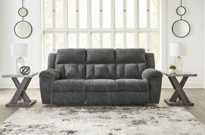 Haines Furniture Outlet - Ashley Furniture - Frohn Living Room - DBL Rec Loveseat w/Console / Chocolate - 3740794