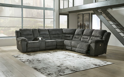 Haines Furniture Outlet - Ashley Furniture - Nettington Sectional - 4-Piece Power Reclining Sectional / Smoke - 44101S3
