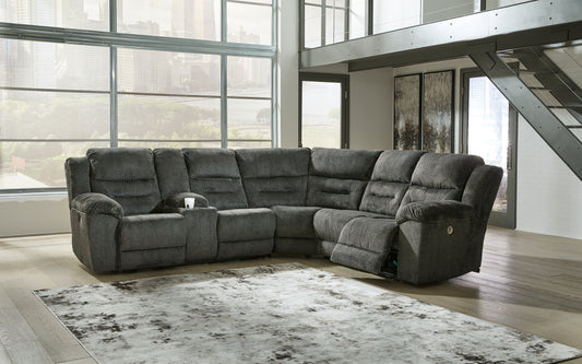 Haines Furniture Outlet - Ashley Furniture - Nettington Sectional - 4-Piece Power Reclining Sectional / Smoke - 44101S3