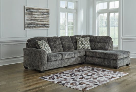 Haines Furniture Outlet - Ashley Furniture - Lonoke Sectional - RAF 2-Piece Sectional with Chaise / Gunmetal - 50504S1