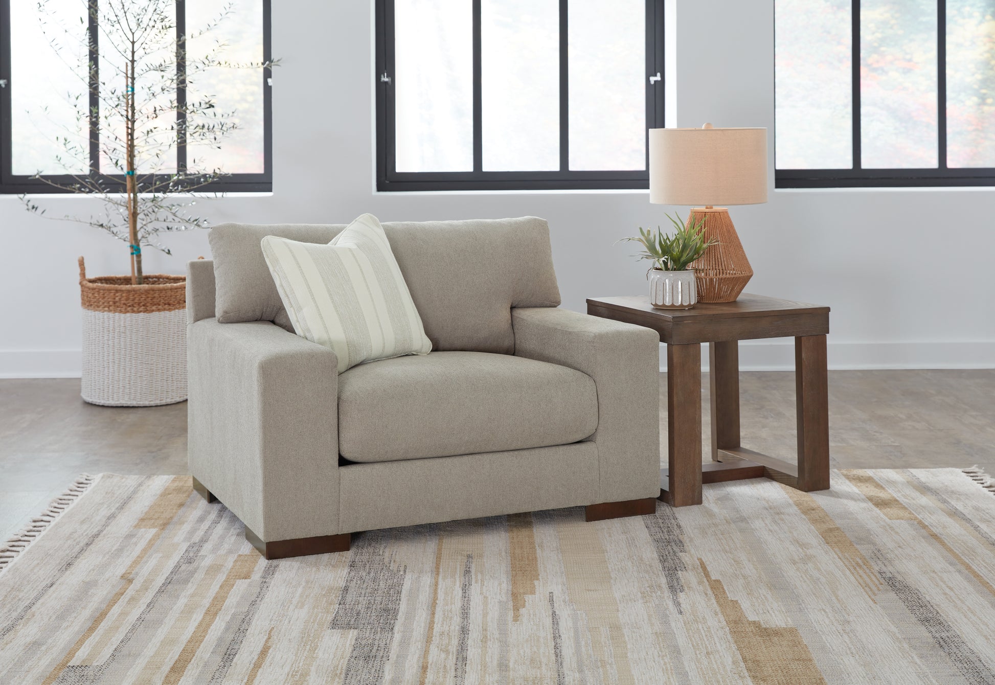 Haines Furniture Outlet - Ashley Furniture - Maggie Living Room - Chair and a Half / Flax - 5200423