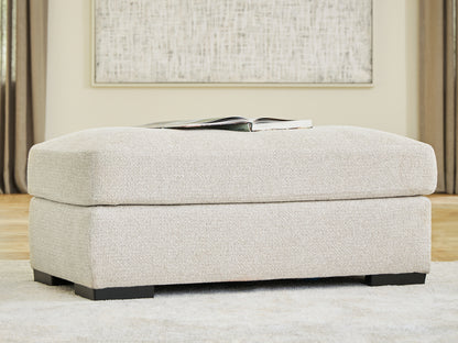 Haines Furniture Outlet - Ashley Furniture - Conlee-Pike Living Room - Ottoman / Linen - PC8131014