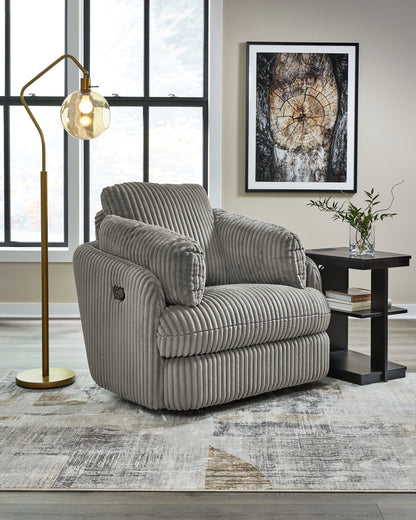 Haines Furniture Outlet - Ashley Furniture - Tie-Breaker Living Room - Swivel Glider Recliner / Ivory - 9490261