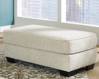 Haines Furniture Outlet - Ashley Furniture - Monaghan Living Room - Ottoman / Sandstone - 9620514