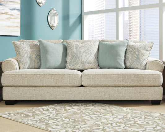 Haines Furniture Outlet - Ashley Furniture - Monaghan Living Room - Ottoman / Sandstone - 9620514