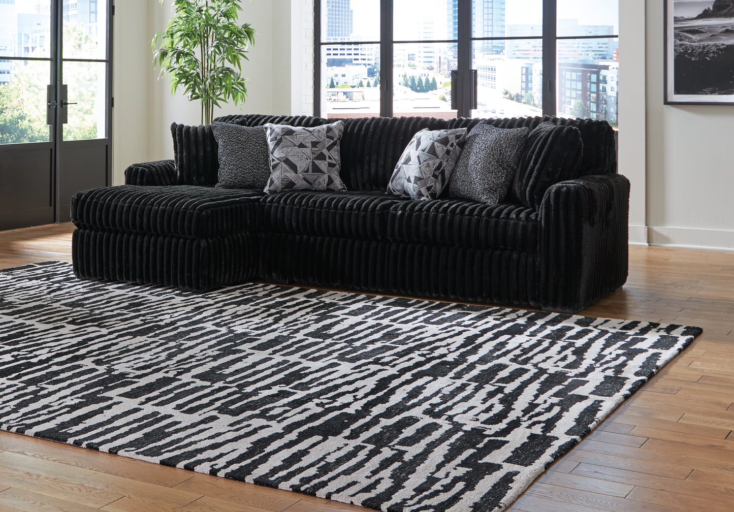 Haines Furniture Outlet - Ashley Furniture - Midnight-Madness Sectional - LAF 3-Piece Sectional with Chaise / Onyx - 98103S9