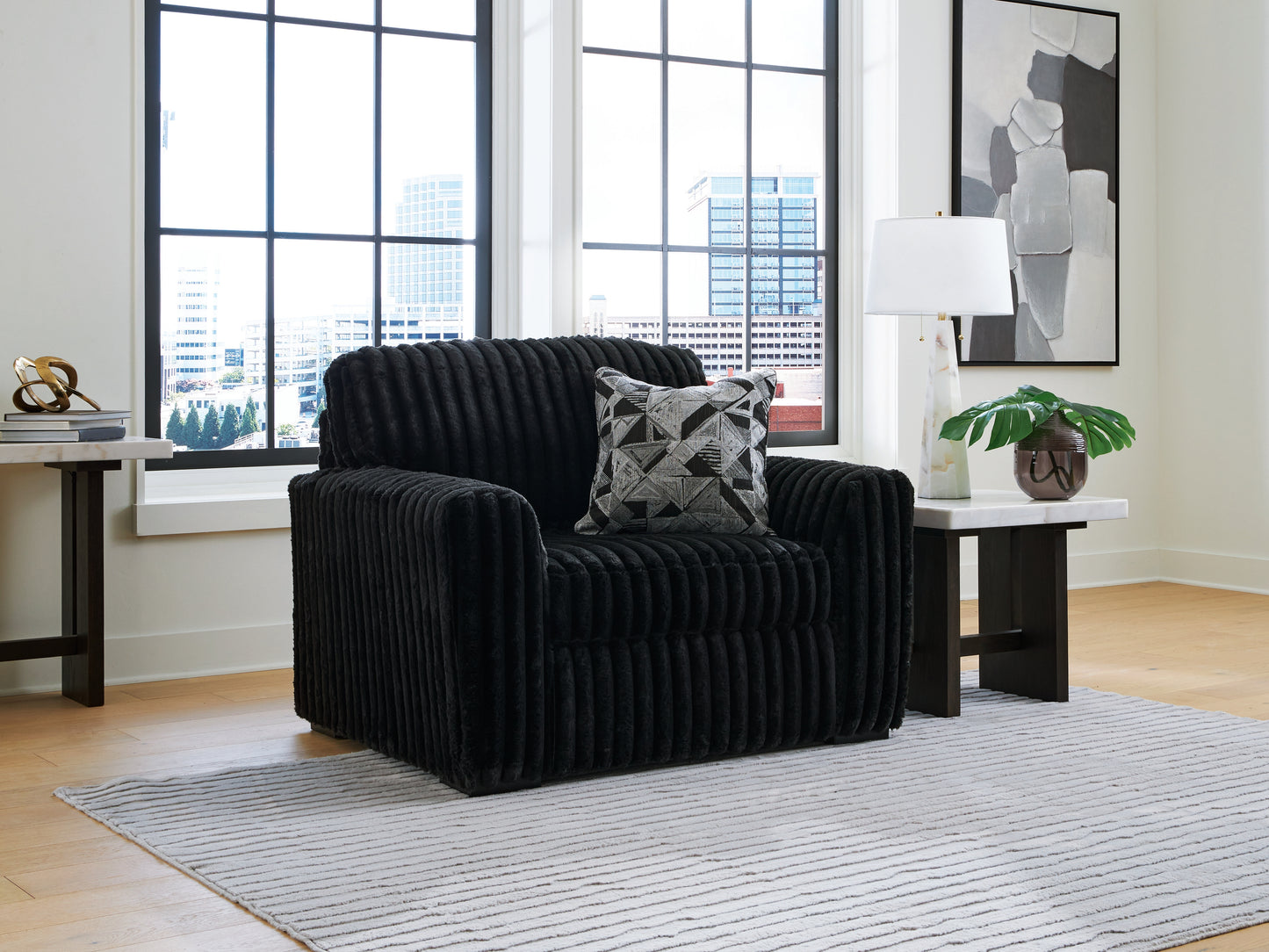 Haines Furniture Outlet - Ashley Furniture - Midnight-Madness Living Room - Chair and a Half / Onyx - 9810323