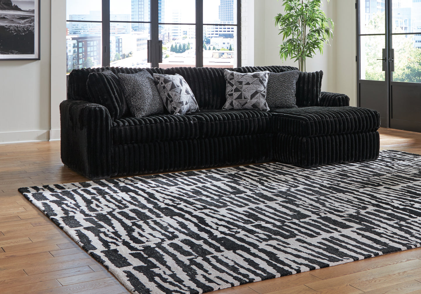 Haines Furniture Outlet - Ashley Furniture - Midnight-Madness Sectional - LAF 2-Piece Sectional Sofa with Chaise / Onyx - 98103S2