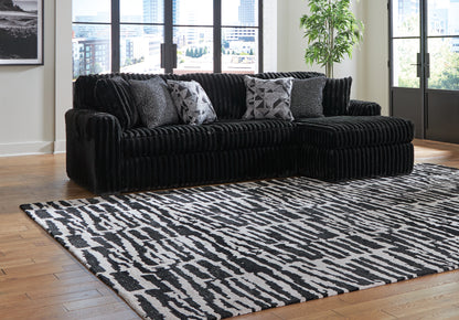 Haines Furniture Outlet - Ashley Furniture - Midnight-Madness Sectional - LAF 2-Piece Sectional Sofa with Chaise / Onyx - 98103S2