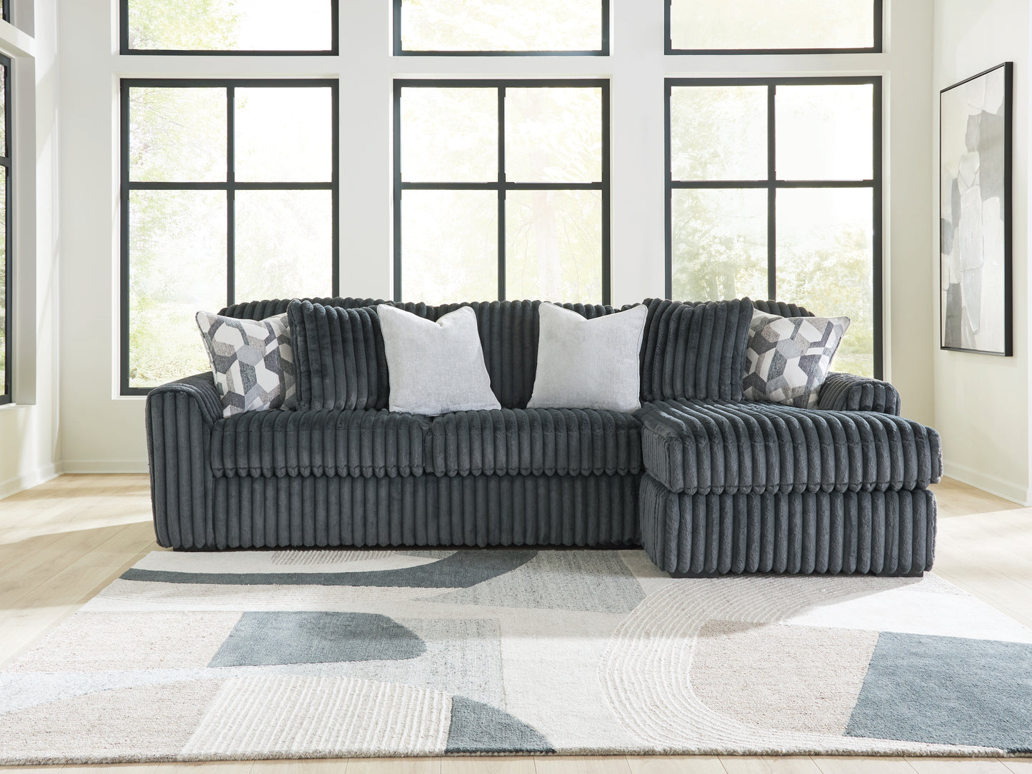 Haines Furniture Outlet - Ashley Furniture - Midnight-Madness Sectional - LAF 2-Piece Sectional Sofa Chaise / Gunmetal - 98105S3