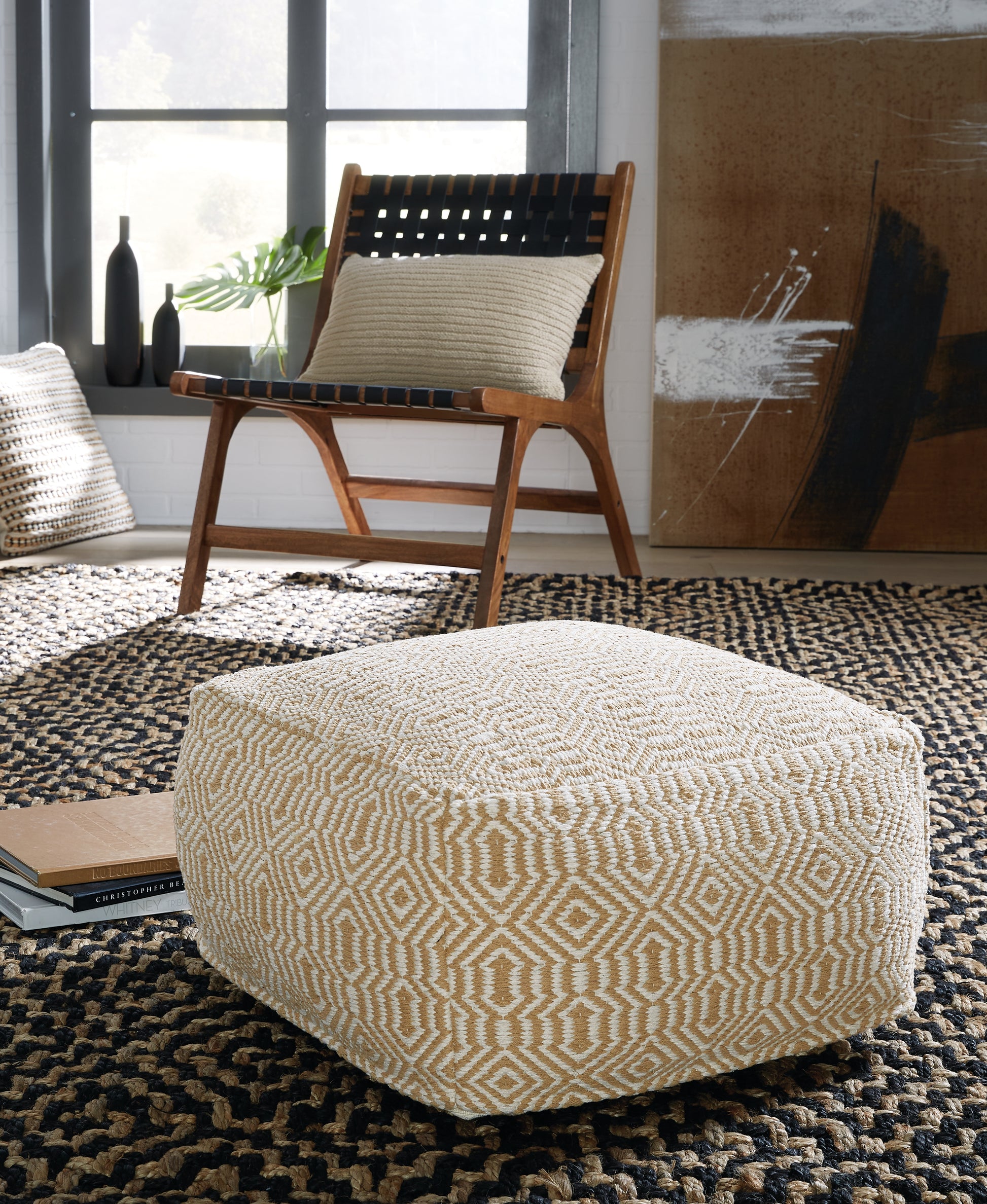 Haines Furniture Outlet - Ashley Furniture - Adamont Pouf - Pouf / Tan/Ivory - A1001059