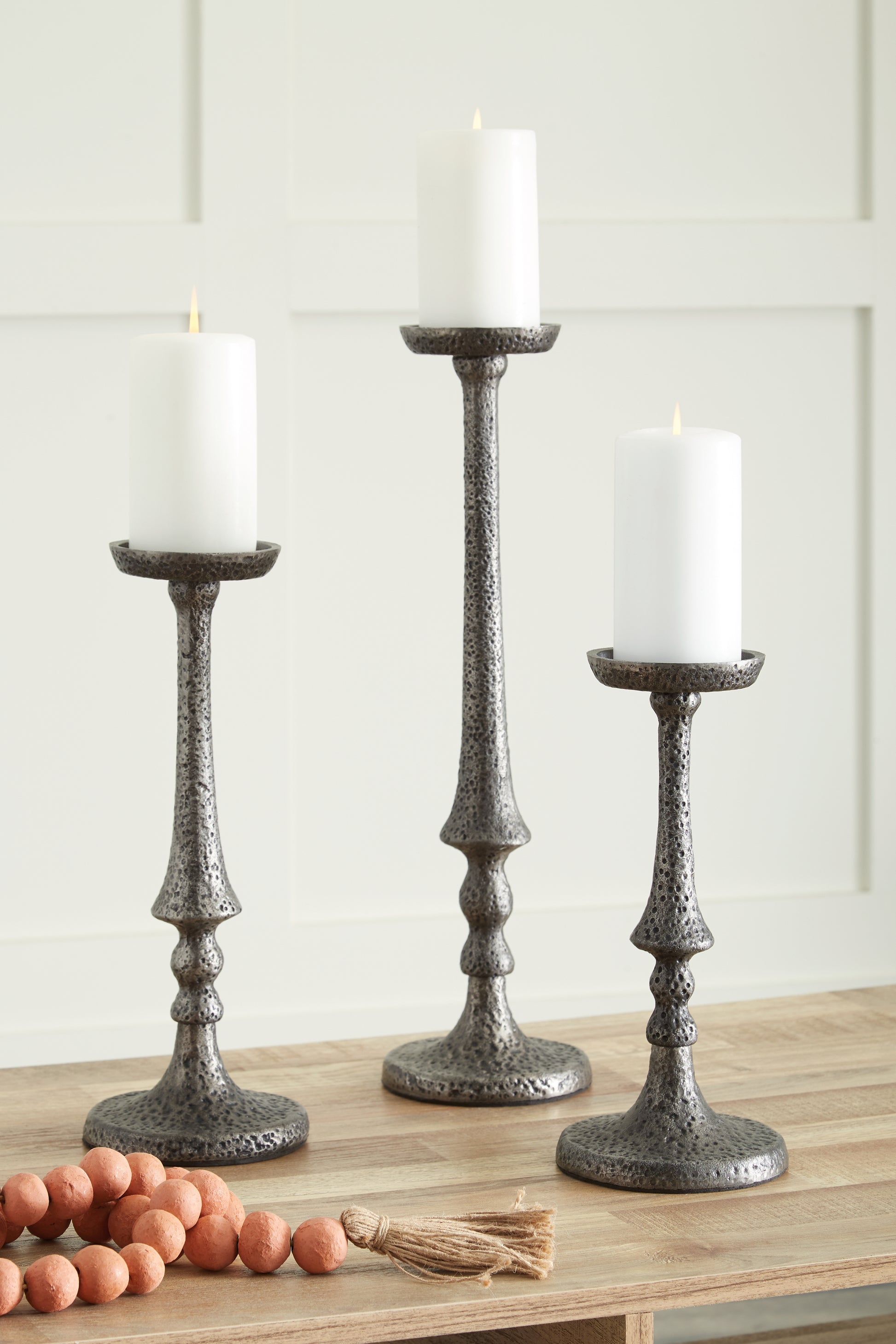 Haines Furniture Outlet - Ashley Furniture - Eravell Candle Holder - Candle Holder Set (3/CN) / Pewter Finish - A2000584
