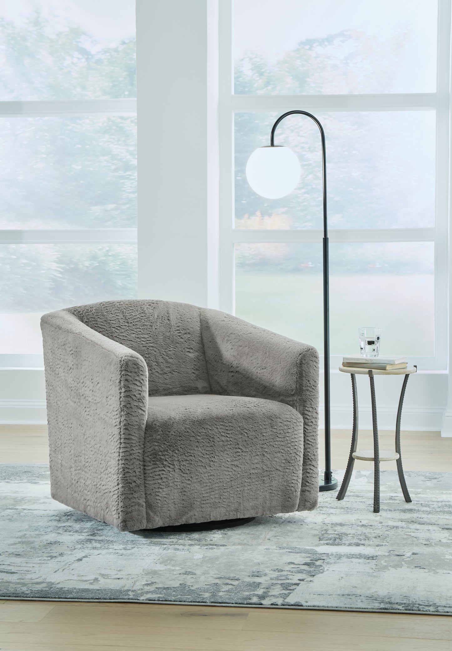 Haines Furniture Outlet - Ashley Furniture - Bramner Accent Chair - Swivel Accent Chair / Charcoal - A3000330