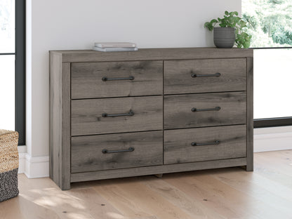 Haines Furniture Outlet - Ashley Furniture - Graystorm Bedroom - Six Drawer Dresser / Brown Gray - PCB2405-31