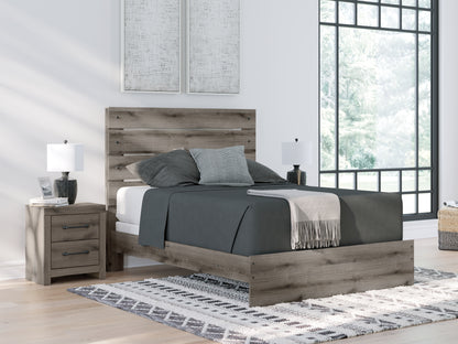 Haines Furniture Outlet - Ashley Furniture - Graystorm Bedroom - Queen Panel Bed / Brown Gray - PCB2405B2