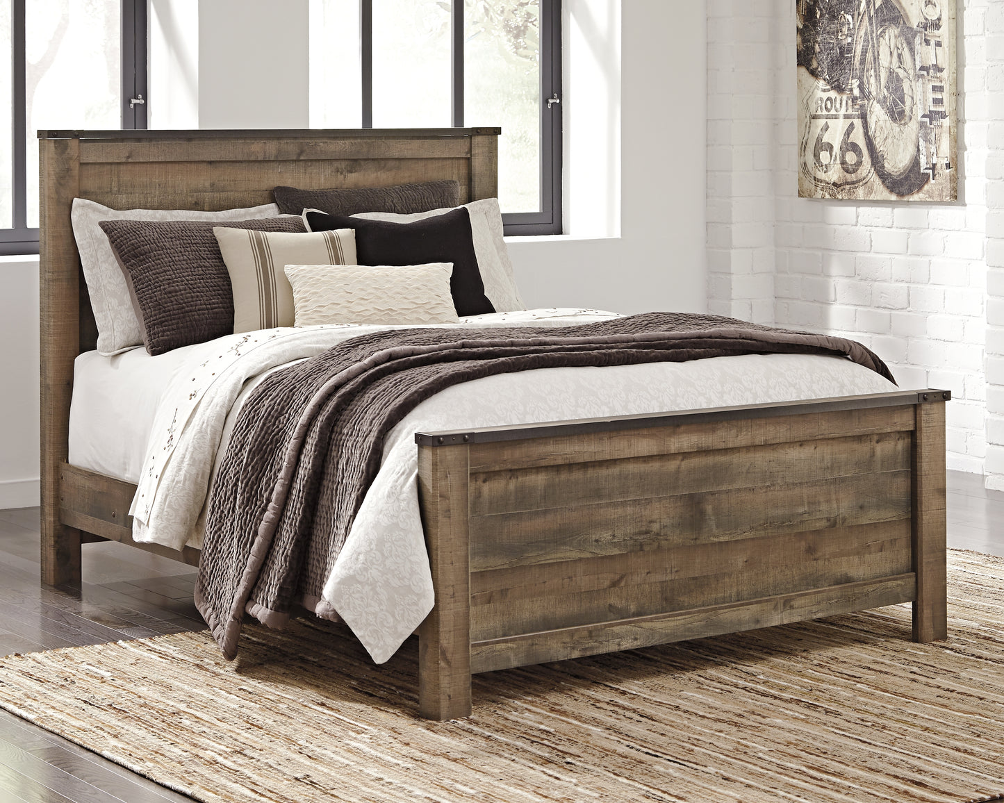 Haines Furniture Outlet - Ashley Furniture - Trinell Bedroom - Queen Panel Bed / Brown - B446B11