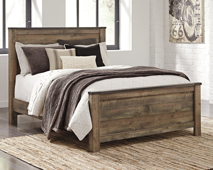 Haines Furniture Outlet - Ashley Furniture - Trinell Bedroom - Queen Panel Bed / Brown - B446B11