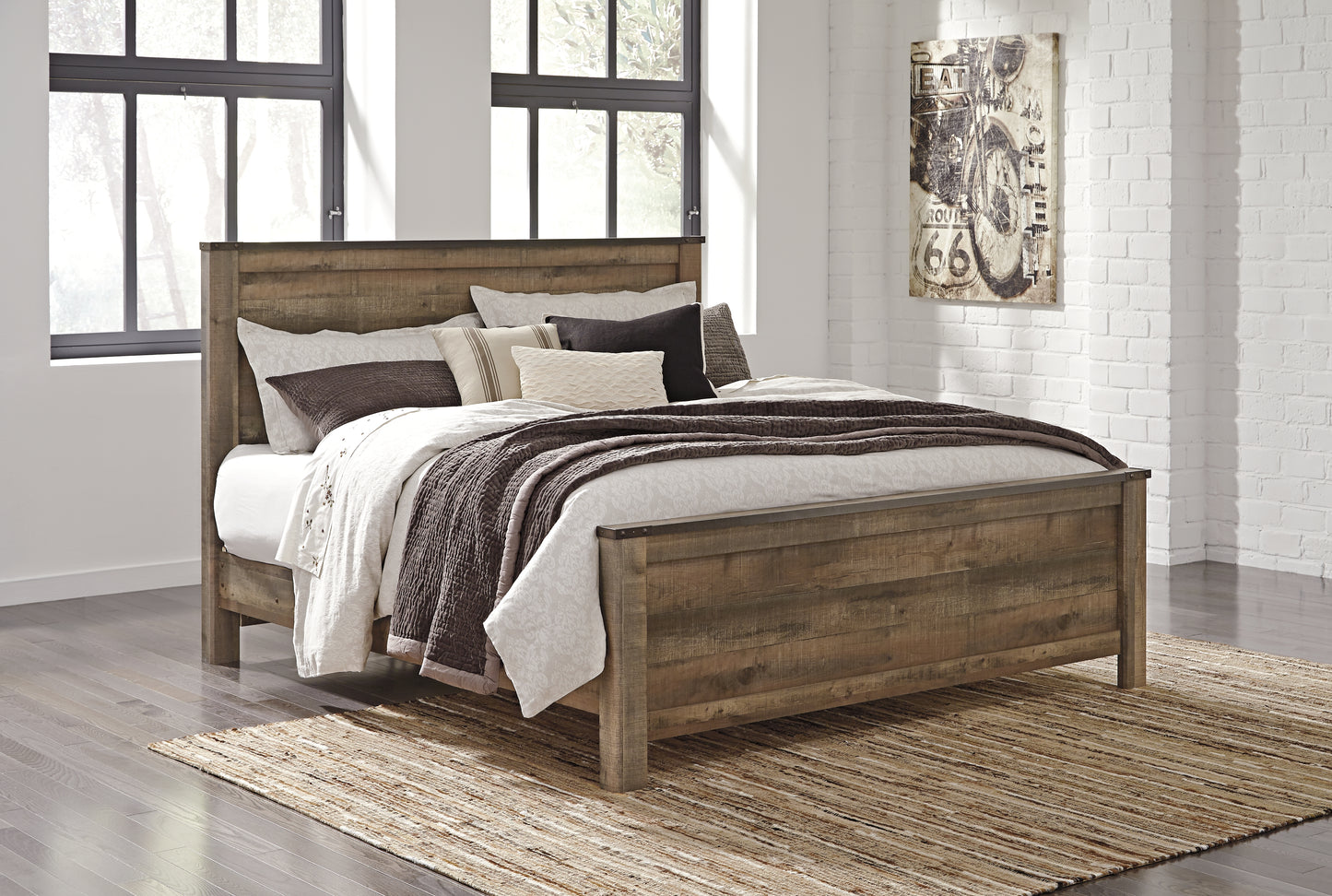 Haines Furniture Outlet - Ashley Furniture - Trinell Bedroom - King Panel Bed / Brown - B446B23
