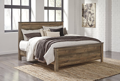 Haines Furniture Outlet - Ashley Furniture - Trinell Bedroom - King Panel Bed / Brown - B446B23