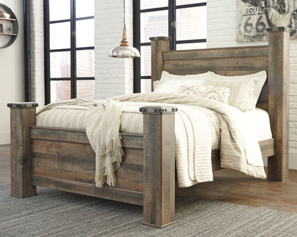Haines Furniture Outlet - Ashley Furniture - Trinell Bedroom - Queen Poster Bed / Brown - B446B40