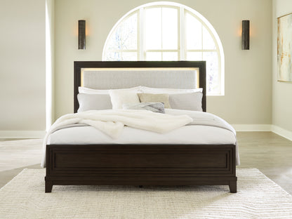 Haines Furniture Outlet - Ashley Furniture - Neymorton Bedroom - California King Upholstered Panel Bed / Dark Grayish Brown - B618B5