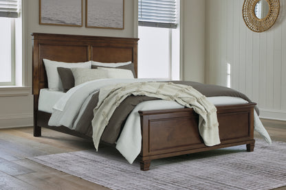 Haines Furniture Outlet - Ashley Furniture - Danabrin Bedroom - Queen Panel Bed / Brown - B685B2
