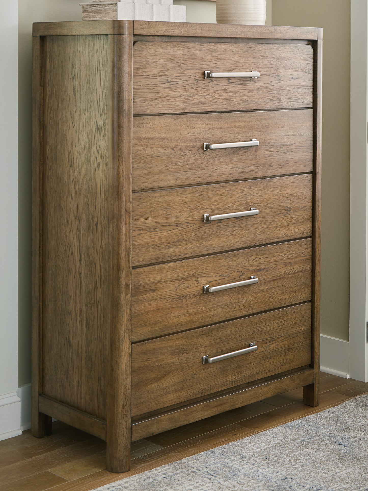 Haines Furniture Outlet - Ashley Furniture - Cabalynn Bedroom - Five Drawer Chest / Light Brown - B974-46