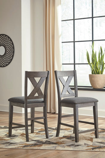 Haines Furniture Outlet - Ashley Furniture - Caitbrook Dining Room - Counter Height Upholstered Bar Stool (Set of 2) / Gray - D388-124X2
