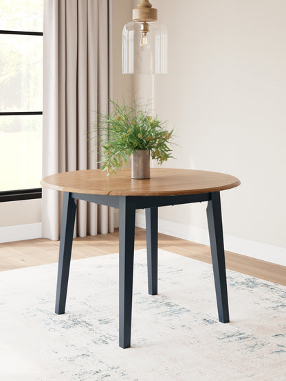 Haines Furniture Outlet - Ashley Furniture - Gesthaven Dining Room - Round DRM Drop Leaf Table / Natural/Blue - D399-15