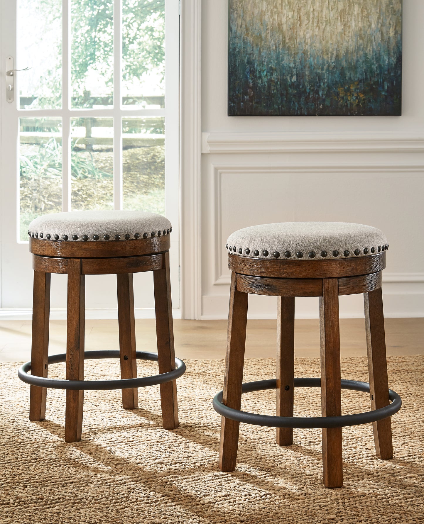 Haines Furniture Outlet - Ashley Furniture - Valebeck Dining Room - UPH Swivel Stool (1/CN) / Brown/Black - D546-124