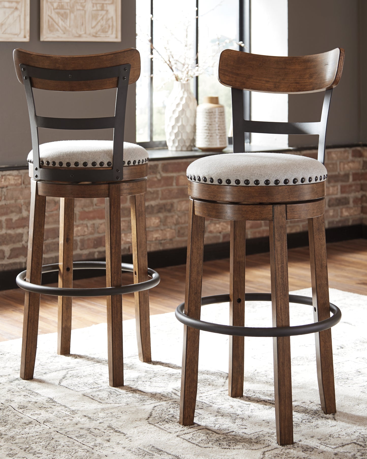 Haines Furniture Outlet - Ashley Furniture - Valebeck Dining Room - Tall UPH Swivel Barstool(1/CN) / Brown - D546-430